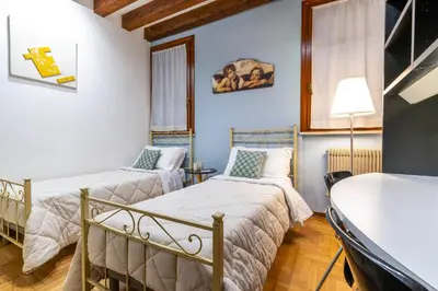 Letto o letti in una camera di San Marco - 2 bedrooms with lift