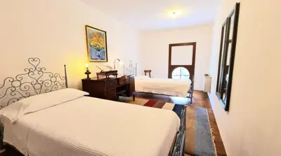 Letto o letti in una camera di Castello di Lispida