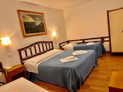 Letto o letti in una camera di Hotel Canada