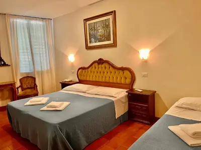 Letto o letti in una camera di Hotel Canada