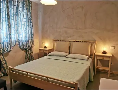 Letto o letti in una camera di Affittacamere Borgo Sabbionara