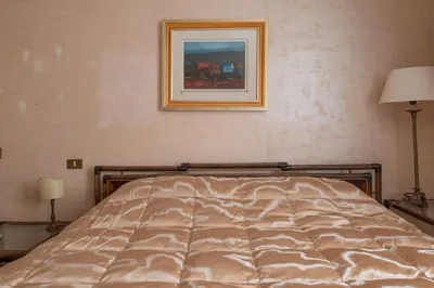 Letto o letti in una camera di Suite Corte Segreta CANAL WIEW