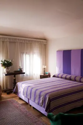 Letto o letti in una camera di Villa Barberina