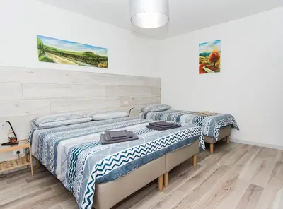 Letto o letti in una camera di B&B Borgo Antico