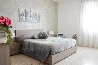 Letto o letti in una camera di Appartamento Ciclamino
