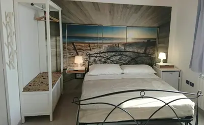 Letto o letti in una camera di Casa Lagunare