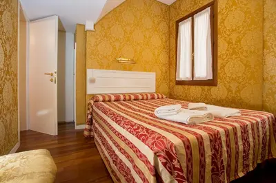 Letto o letti in una camera di Residenza Goldoni