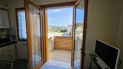 TV o dispositivi per l'intrattenimento presso Residence Sole e Mare appartamenti