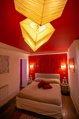 Letto o letti in una camera di B&B La Corte