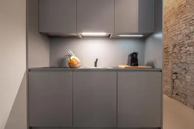 Cucina o angolo cottura di OFFICINE CAVOUR Piazza Cavour