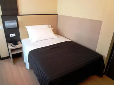 Letto o letti in una camera di Hotel Alverì