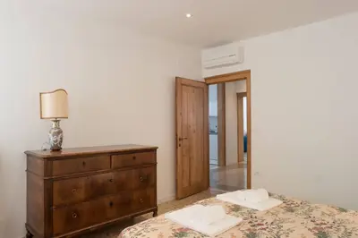 Letto o letti in una camera di Ca' Dandolo by Venicevillas