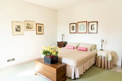 Letto o letti in una camera di Villa Paola