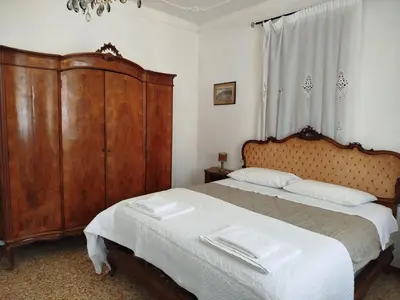 Letto o letti in una camera di B&B Exclusive