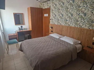 Letto o letti in una camera di Antica Raffineria