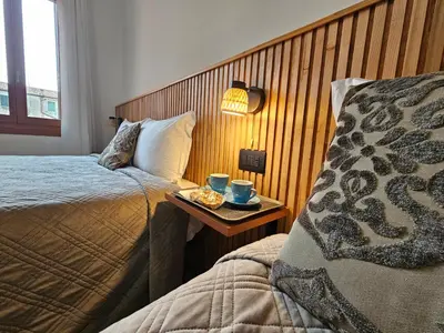 Letto o letti in una camera di Antica Raffineria