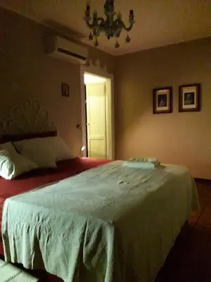 Letto o letti in una camera di Tenuta Crescentini-ValleMura ,appartamenti con entrata indipendente