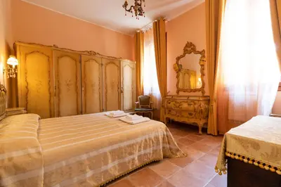 Letto o letti in una camera di Queen House Venezia