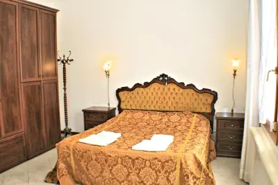 Letto o letti in una camera di Queen House Venezia