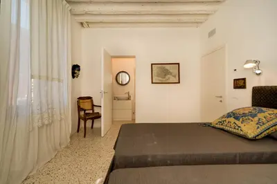 Letto o letti in una camera di Ca' Dorina Luxury