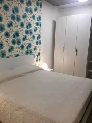Letto o letti in una camera di dimora scaldaferro