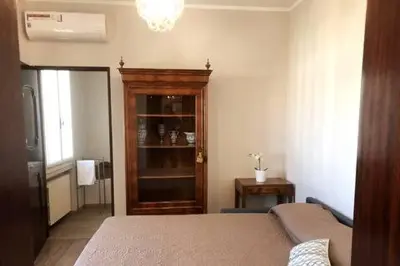 Letto o letti in una camera di dimora scaldaferro