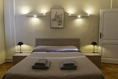 Letto o letti in una camera di TONIOLO VENICE ROOMS