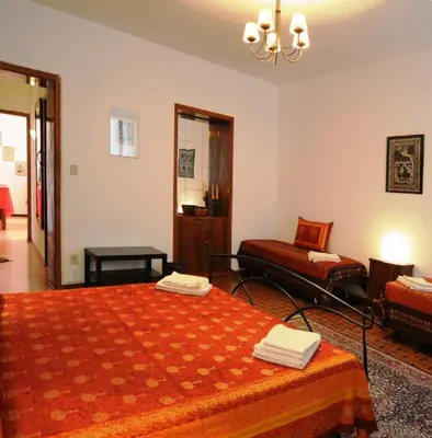 Letto o letti in una camera di B&B Arabesque