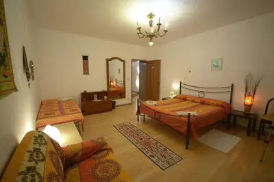 Letto o letti in una camera di B&B Arabesque