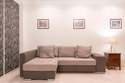 Area soggiorno di Riva Palace Apartments by Wonderful Italy