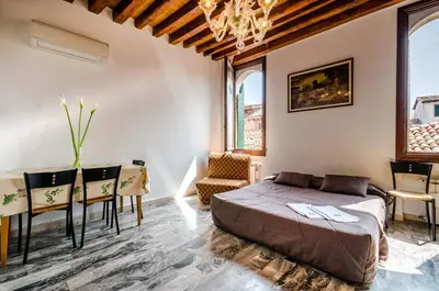 Letto o letti in una camera di Venice Apartments