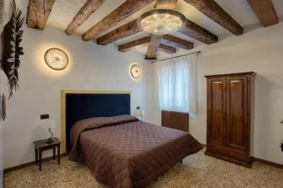Letto o letti in una camera di Hotel Guerrato