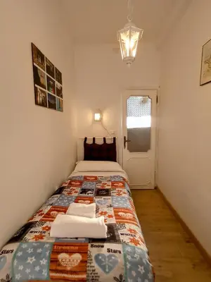 Letto o letti in una camera di LA GUGLIA - Guglia House apartment-CANNAREGIO-VENEZIA