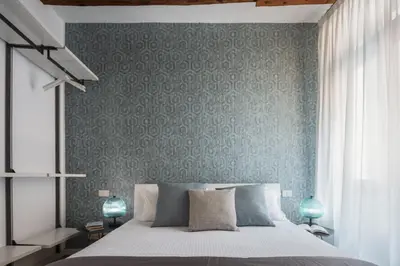 Letto o letti in una camera di Erbaria Boutique Apartment R&R