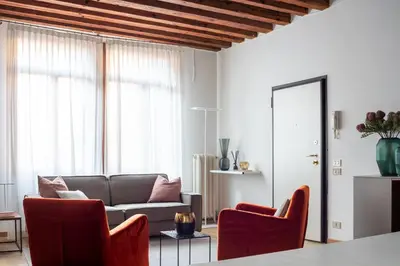 Area soggiorno di Erbaria Boutique Apartment R&R