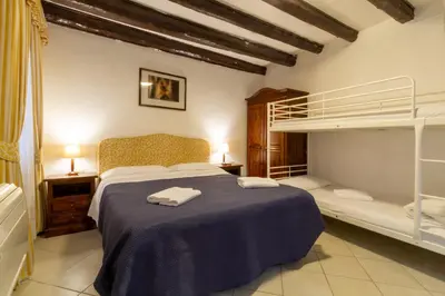 Letto o letti in una camera di Art Dreams Apartment Teatro Italia