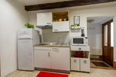 Cucina o angolo cottura di Art Dreams Apartment Teatro Italia