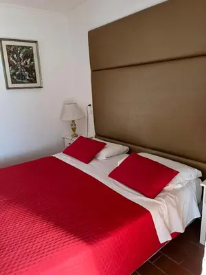 Letto o letti in una camera di Hotel Antica Fenice