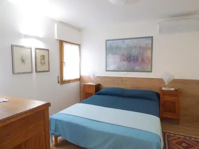 Letto o letti in una camera di Ca' Bellotto