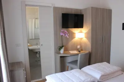 Letto o letti in una camera di Hotel Loreley