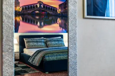 Letto o letti in una camera di Cà Sant`Angelo