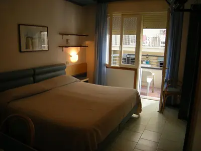 Letto o letti in una camera di Hotel Ambasciatori Palace