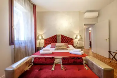 Letto o letti in una camera di Casa Verona