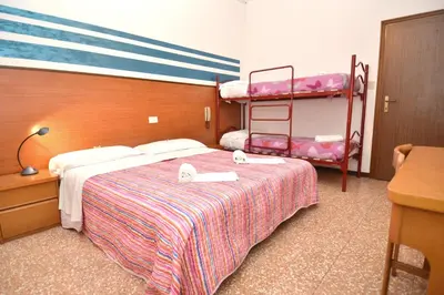 Letto o letti in una camera di Hotel Edera