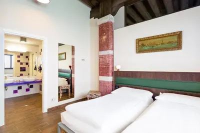 Letto o letti in una camera di Generator Venice