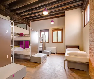 Letto o letti in una camera di Generator Venice