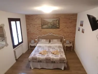 Letto o letti in una camera di La Corte Incantata (alla Biennale)