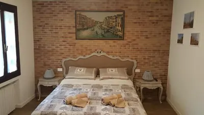 Letto o letti in una camera di La Corte Incantata (alla Biennale)