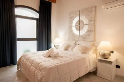 Letto o letti in una camera di Stella Marina 2