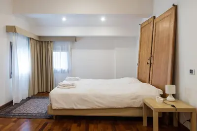 Letto o letti in una camera di Palazzo Raspanti